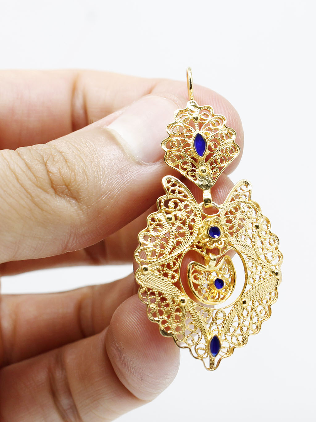 Traditional earrings with enamel